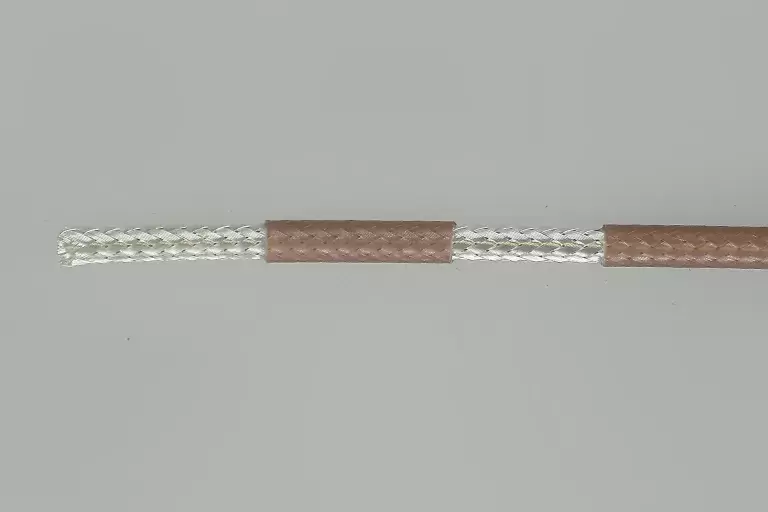 Silver wire inside wrapper of brown color.